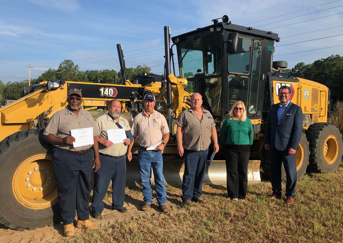 South Georgia Technical College President Dr. John Watford (far right) and SGTC Crisp County Business and Industry Director Michelle McGowan (second from right) are shown above with Motor Graders participants from Crisp County (l to r): Hubbard Odom, Doug Steward, Mike Morris, and Charles Mozo.
