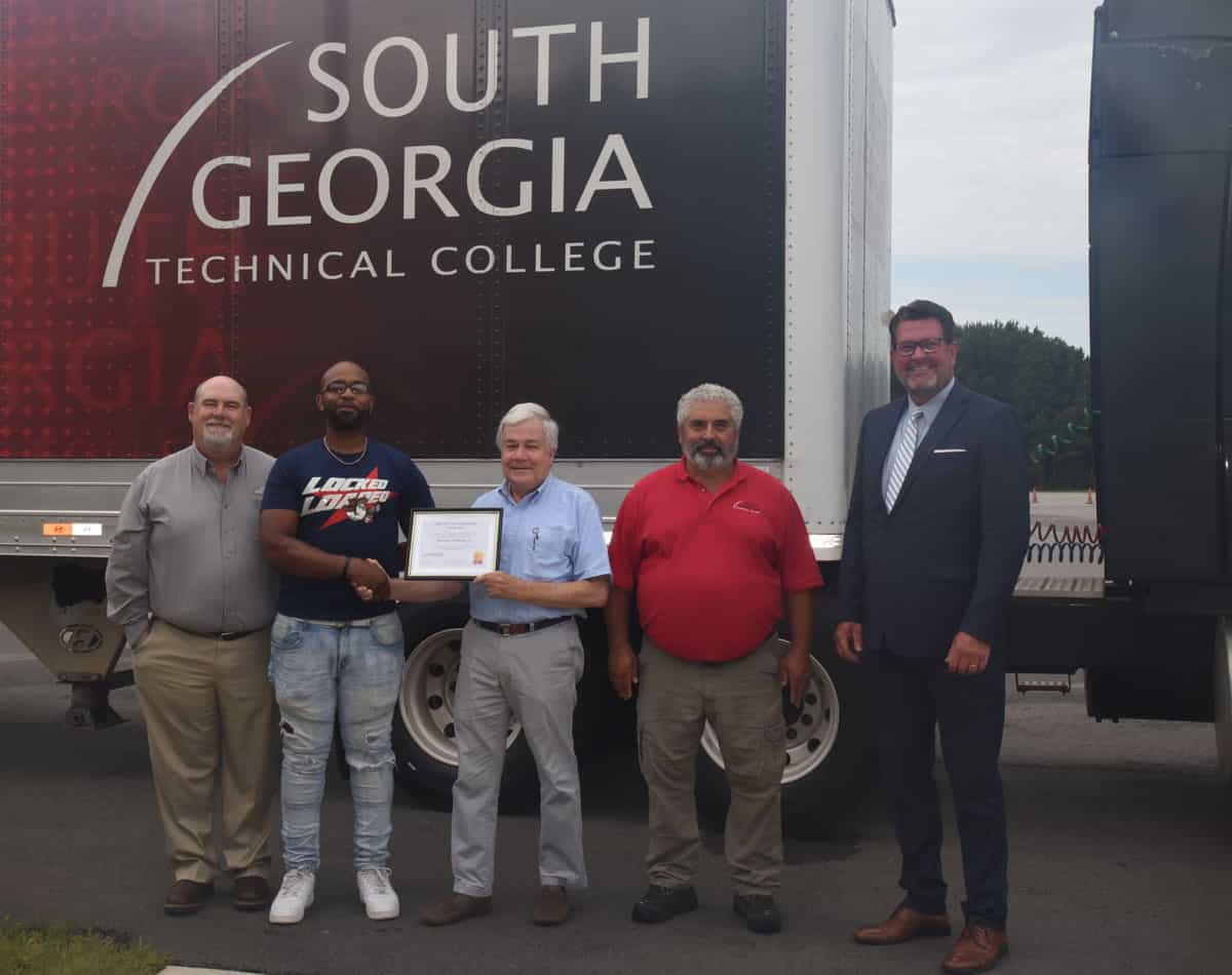 SGTC Commercial Truck Driving Lead Instructor Robert Cook is shown above (l to r) with SGTC Client First Insurance Solutions scholarship recipient Sanchez Graham, Jr., along with Client First Insurance Solutions Jody Wade, SGTC CDL instructor Ken Coptsias and SGTC President Dr. John Watford.