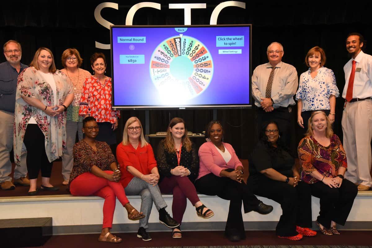 Shown above are the members of the South Georgia Technical College Internal TechForce 2022 fund drive. They include: (Back row) Pat Peacock, Kelly Everett, Tracy Israel, Lillie Ann Winn, Dr. David Finley, Tami Blount and Chester Taylor. Shown seated on the front row are: Virgilia Edge, Michelle McGowan, Leah Cannady, Jennifer Rogers, Michele Seay and Teresa McCook. Not shown Mike Enfinger, Melissa Grantham, and Dorothea McKenzie.
