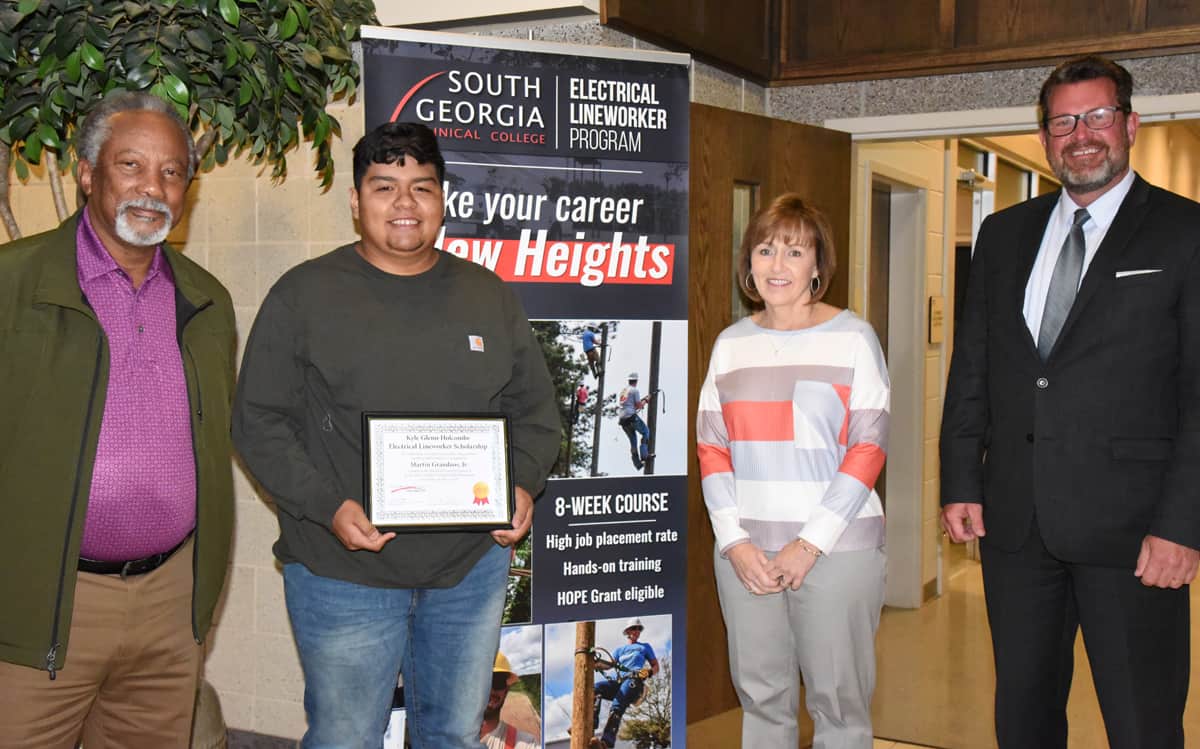 South Georgia Technical College Electrical Lineworker instructor Sidney Johnson is shown above with Matrin Granados, Jr., of Vidalia, who is the SGTC Foundation Kyle Glenn Holcombe Electrical Lineworker scholarship recipient. SGTC Economic Development Assistant and Partnership Coordinator Tami Blount and SGTC President Dr. John Watford are also shown with Granados during the scholarship presentation.