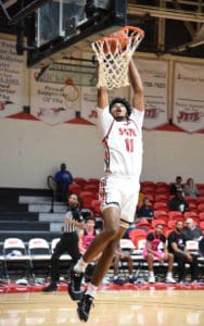 Bryce Turner, 11, goes up for the dunk.