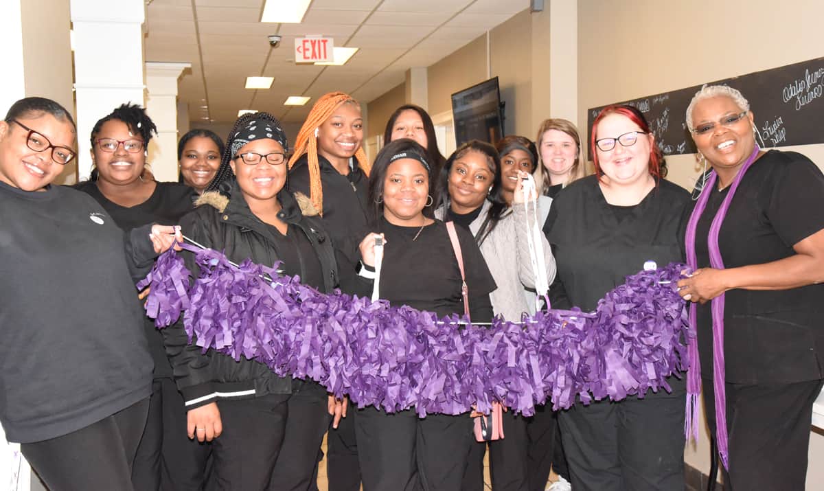 Members of the SGTC Cosmetology classes are shown above participating in the National Violence Awareness Month activities.