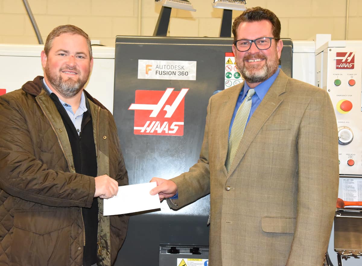 South Georgia Technical College President Dr. John Watford (right) is shown above with SGTC Precision Machining and Manufacturing Instructor, (left) with the Gene Haas donation to the SGTC Foundation.
