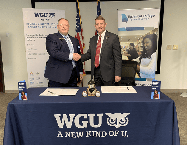 TCSG Commissioner Greg Dozier is shown above after signing the agreement with Western Governors University.