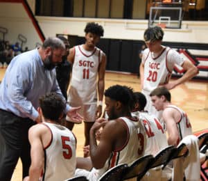 SGTC Jets head coach Chris Ballauer is shown talking with team during a team out.