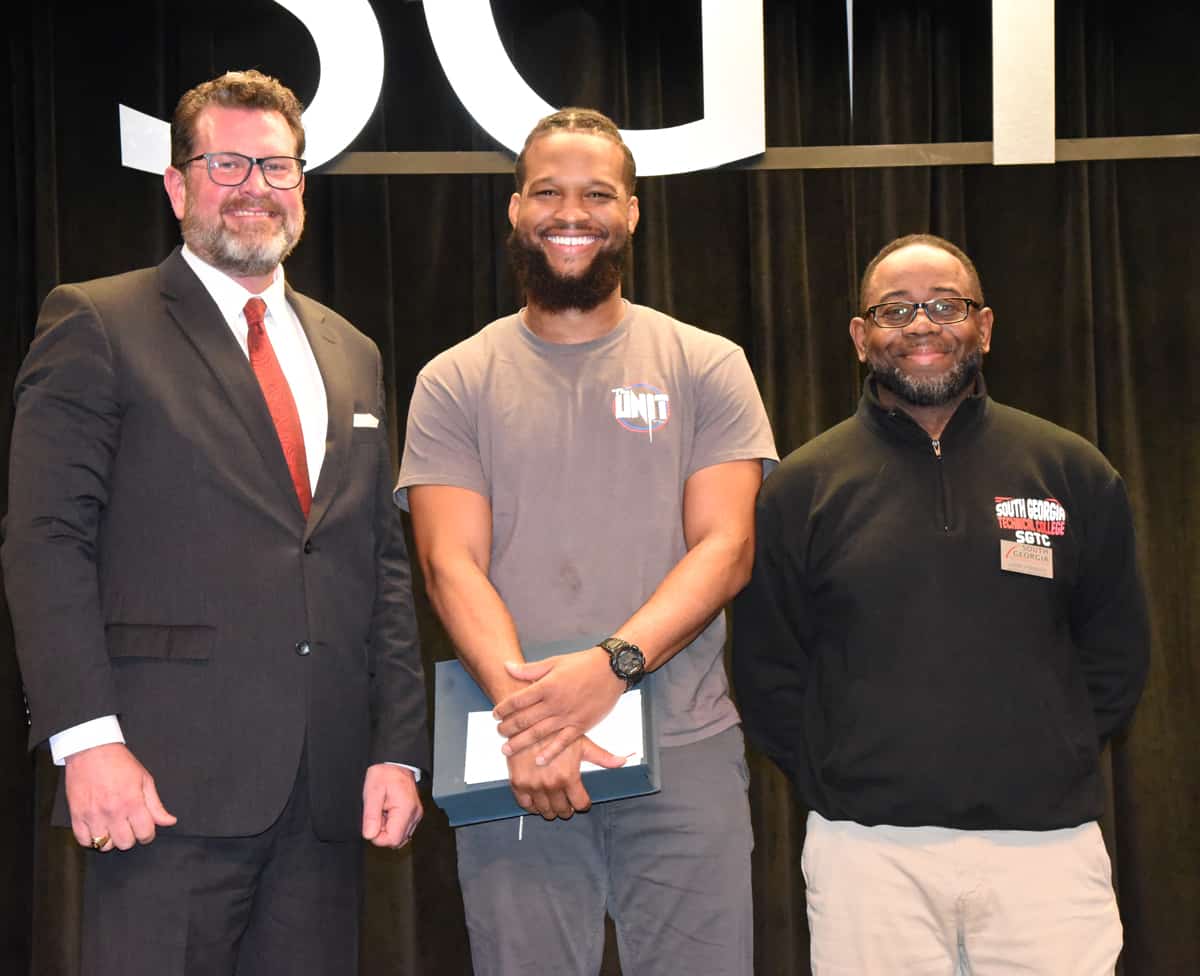 SGTC President Dr. John Watford is shown above with the SGTC 2023 GOAL Winner, Barbering student Tredarrian Colbert, and his Barbering Instructor Andre Robinson.