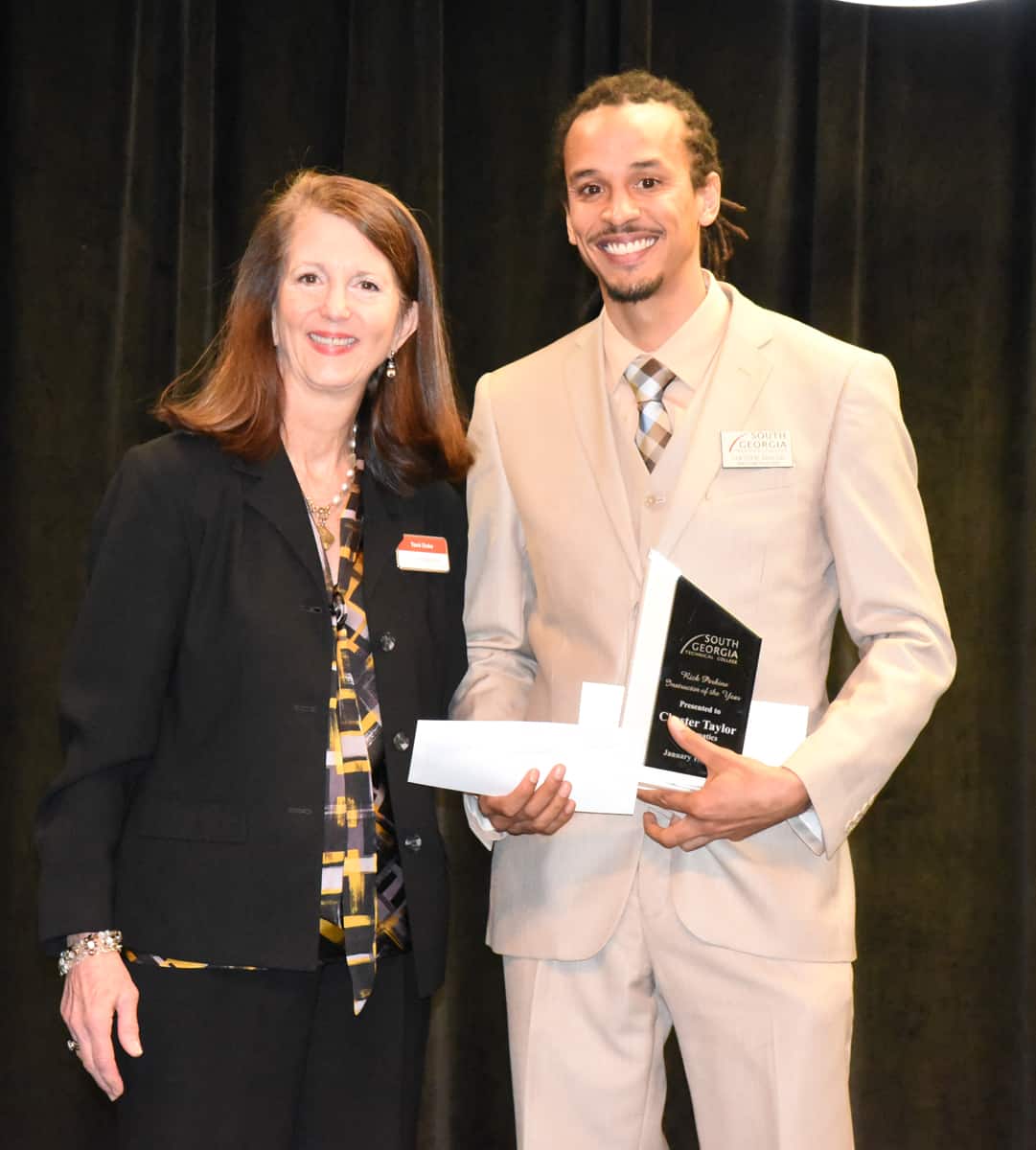 Synovus’ Tami Duke is shown above (l to r) presenting Chester Taylor with a donation from Synovus for being selected as the South Georgia Technical College 2023 Rick Perkins Instructor of the Year.