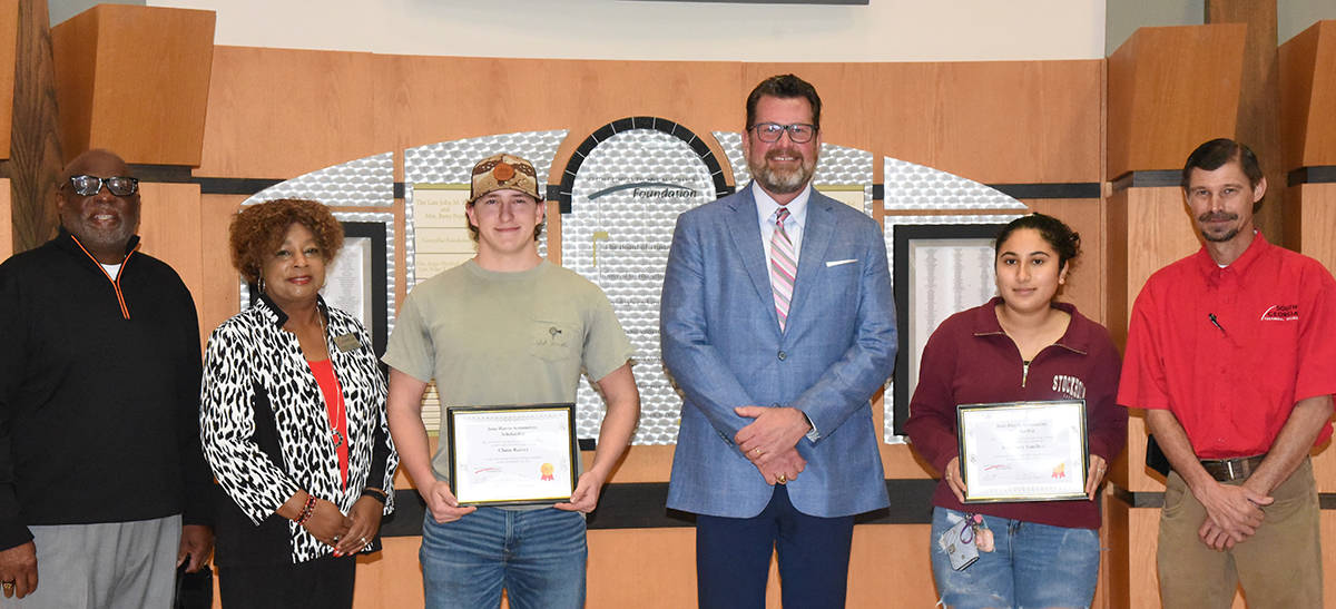 South Georgia Technical College President Dr. John Watford is shown above (center) along with Al Harris (l to r), Vickie Austin, Jones-Harris Scholarship recipients Chase Reeves and Rosemary Sanchez and SGTC Automotive Technology Instructor Brandon Dean. Not shown is SGTC Foundation executive director Su Ann Bird.