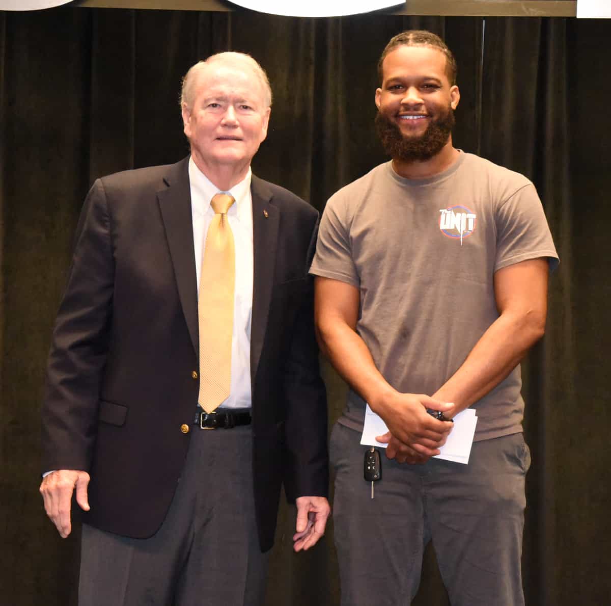 Americus Rotary Club member and Past President Don Smith (l) is shown above presenting a check from the Rotary Club to Tredarrian Colbert (r), who was selected as the SGTC 2023 GOAL student of the year.