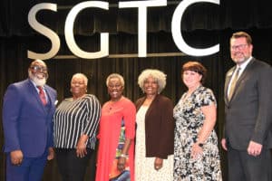 Carvel Lewis is shown above with Cynthia Lewis-Anderson, Dr. Lucy Willis, Alma Willis and John and Barbara Watford.