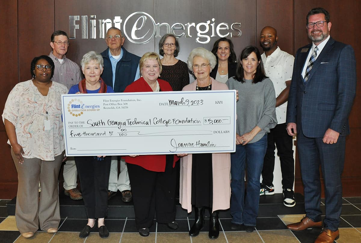 South Georgia Technical College President Dr. John Watford, r, and Su Ann Bird, SGTC Vice President of Institutional Advancement (c), are shown above with members of the Flint Energies Foundation Board who presented SGTC with a check recently.