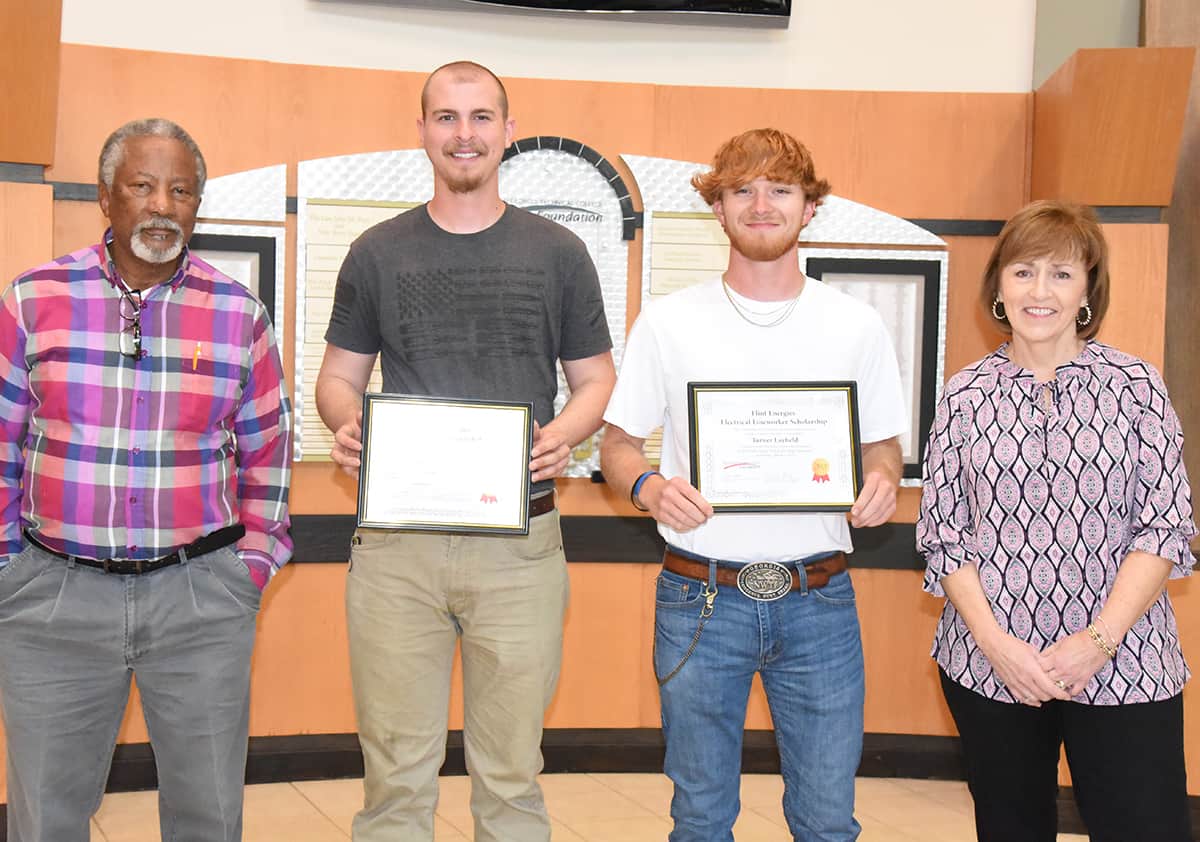 Shown above (l to r) are South Georgia Technical College Electrical Lineworker Instructor Sidney Johnson, Scholarship winners Gavin Teal and Turner Layfield with Economic Development Assistant and Partnership Coordinator Tami Blount.
