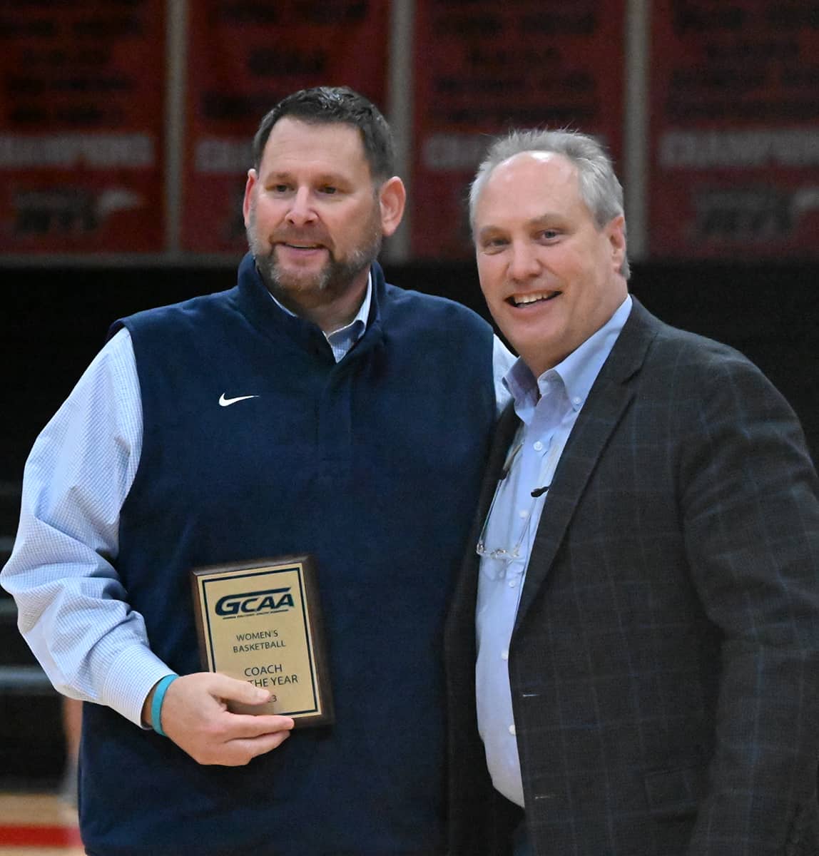 GCAA Commissioner David Elder (right) is shown above presenting SGTC Lady Jets head coach James Frey with the Coach of the Year plaque.