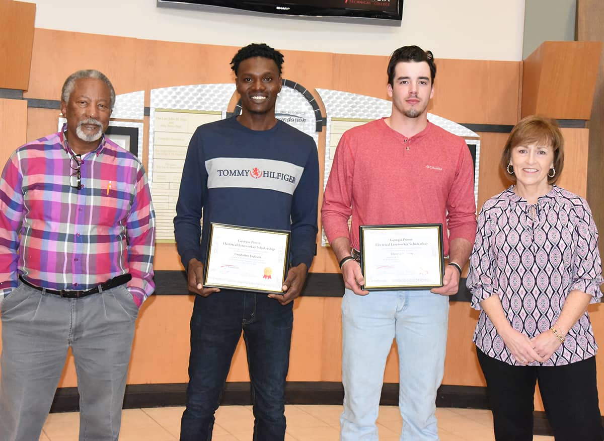 Shown above (l to r) are South Georgia Technical College Electrical Lineworker Instructor Sidney Johnson, Georgia Power Company Electrical Lineworker Scholarship students Murray Somers and Cordarius Jackson along with SGTC Economic Development Assistant and Partnership Coordinator Tami Blount. Not shown is SGTC Vice President of Institutional Advancement and SGTC Foundation Executive Director Su Ann Bird.