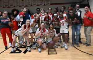 South Georgia Technical College President Dr. John Watford is shown above with the NJCAA Region XVII Champion Lady Jets and their coaching staff.