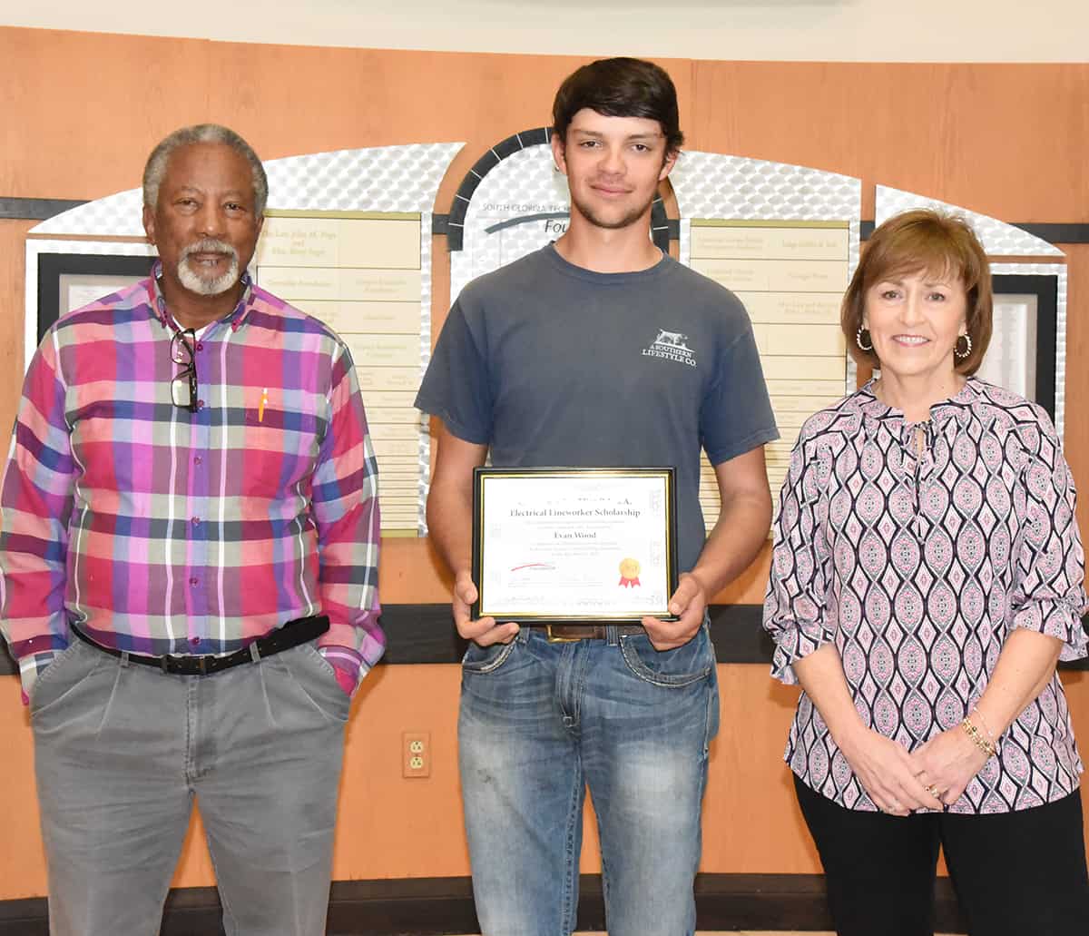 South Georgia Technical College Electrical Lineworker instructor Sidney Johnson is shown above with Evan Wood, who was presented with the Chattahoochee Flint RESA Electrical Lineworker Scholarship by the SGTC Foundation. SGTC’s Partnership Coordinator and Economic Development Assistant Tami Blount is also shown. SGTC Vice President of Institutional Advancement and Executive Director of the SGTC Foundation Su Ann Bird is not shown.
