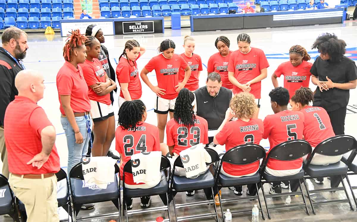 South Georgia Technical College Athletic Director and Lady Jets head coach James Frey (center), was selected as the World Exposure Report NJCAA Division I Women’ Basketball Coach of the Year. He is shown coaching the 2022 – 2023 Lady Jets at the NJCAA National Tournament in Lubbock, Texas.