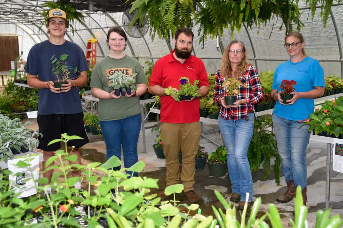 Pictured are SGTC Horticulture instructor Brandon Gross (center) with his students (l-r) John T. Owens of Ellaville, Desirae Cooper of Dry Branch, Lisa Wade of Americus, and Caron Clements of Cobb during the recent plant sale for SGTC students, faculty, and staff.
