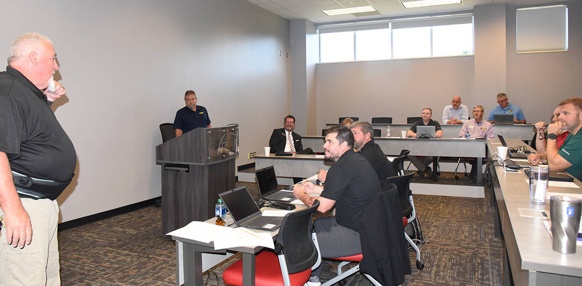Shown above is SGTC Heavy Equipment Dealer Service Technology Instructor Don Rountree shown talking with the CAT Think Big Advisory Committee members recently.
