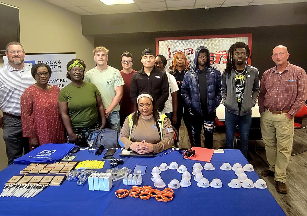SGTC Career Services recently hosted a hiring event where Human Resources Craft Construction Recruiter Sherrie Searcy (seated) shared information with students and instructors about job opportunities with Overland Contracting Inc.
