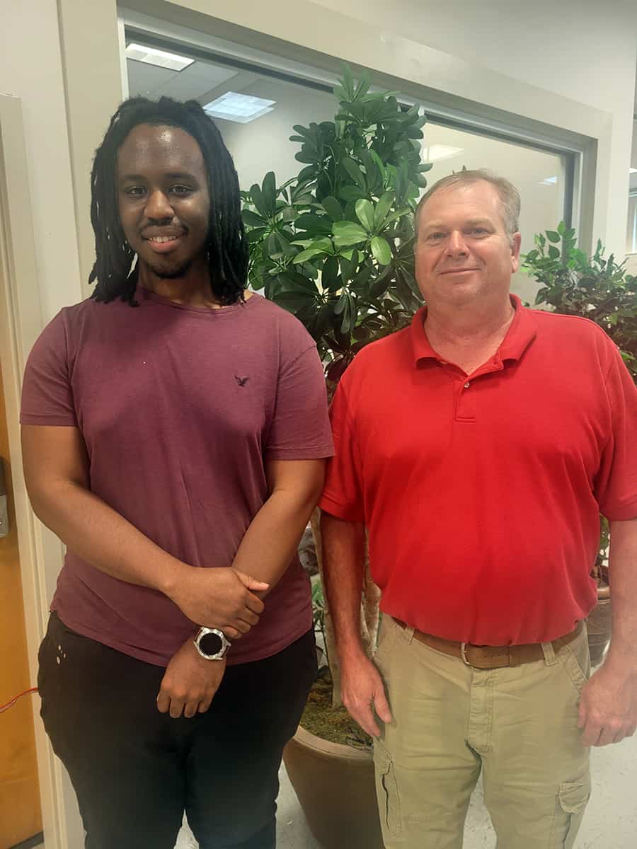 SGTC Electronics Technology student Braxton McGee (left) with Electronics Technology instructor Mike Collins. McGee was recently hired as an Electronics Technician by Robins Air Force Base.