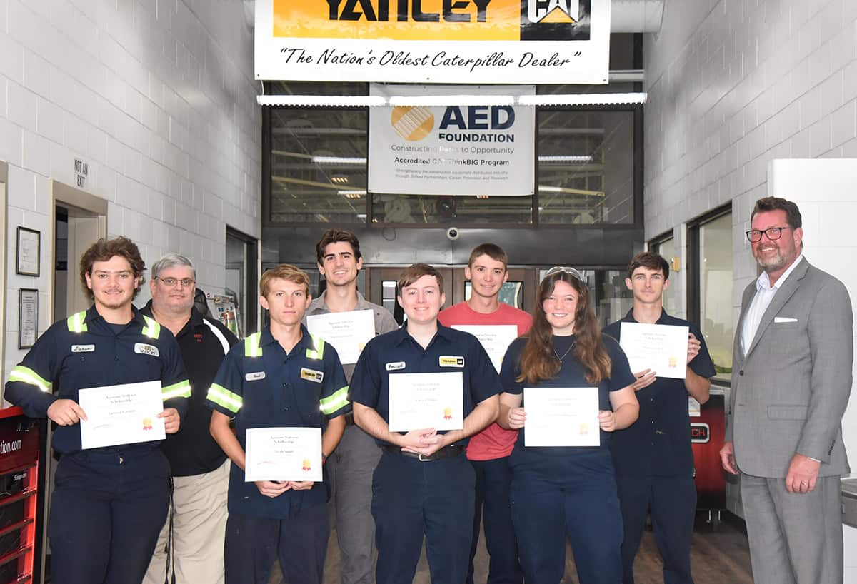 South Georgia Technical College President Dr. John Watford is shown above (far right) with SGTC Heavy Equipment Dealer Service Technology Electric Power Generation instructor Keith McCorkle (back row left) and seven of the CAT Think Big students that received the scholarships for their outstanding academic and leadership qualities.