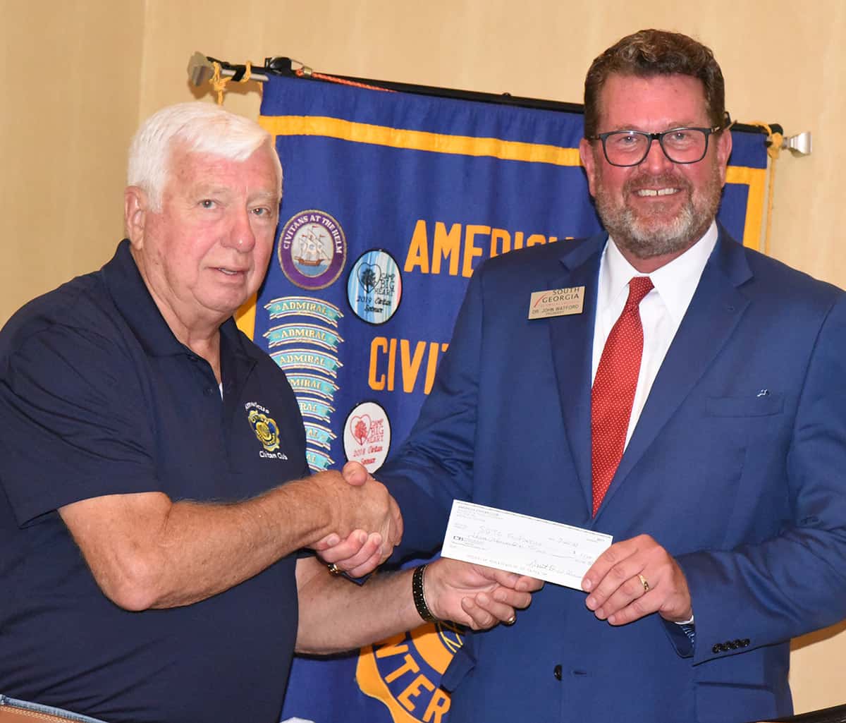 Grant Williams (left) of the Americus Civitan Club is shown above presenting a check to South Georgia Technical College President Dr. John Watford (right) for the Americus Civitan Club’s endowed scholarship for nursing students at South Georgia Technical College.