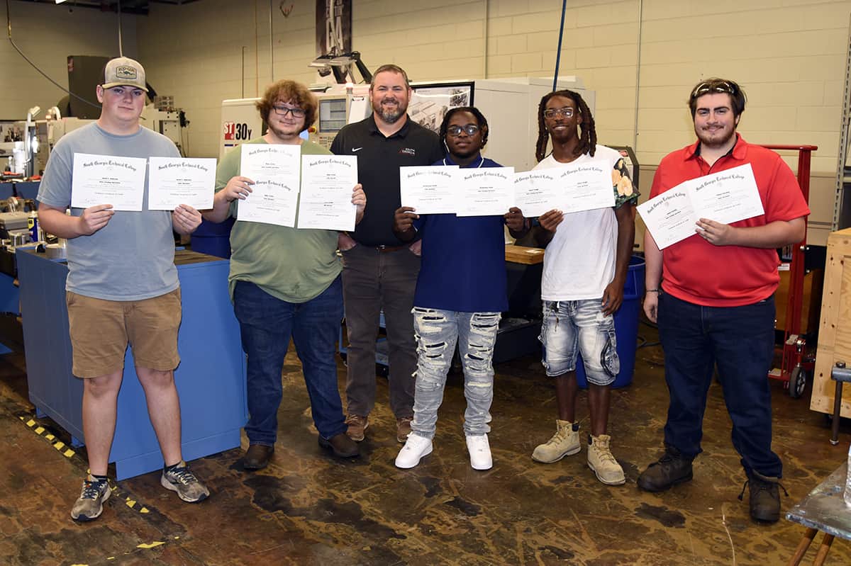 SGTC Precision Machining instructor Chad Brown recently presented Technical Credit Certificates to students (l-r) Jarod Anderson, Blake Archer, MicQuvious Powell, Robert Wright, and Ashton Denning.