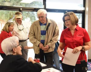 Jets Booster Club President Martha Arrington greeted individuals to the 2023 - 2024 Jets Booster Club Tip-Off Banquet.