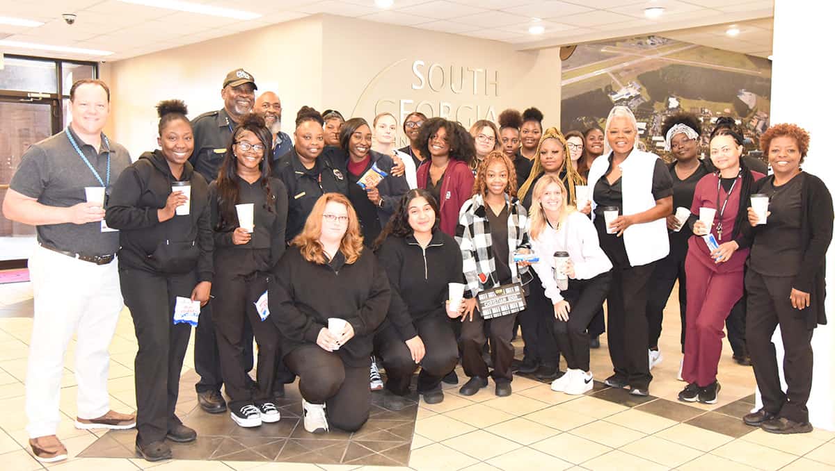 South Georgia Technical College Cosmetology Instructor Dorothea McKenzie, her instructors and students came to the “Coffee With A Cop” celebration in the Odom Center Lobby area.