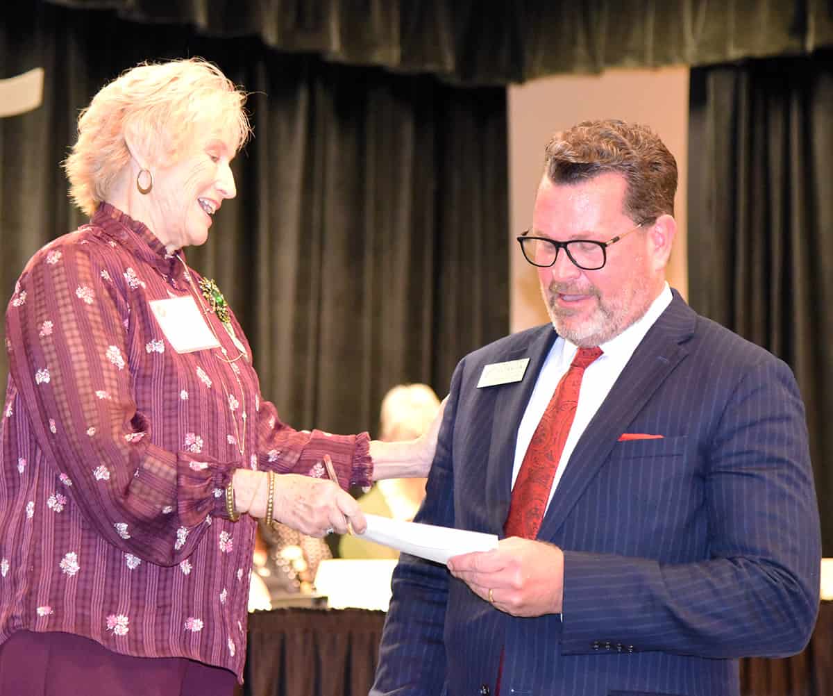Kay Hagler of the Magnolia District of the Garden Club of Georgia is shown above (left) presenting SGTC President John Watford (r) with a donation to the SGTC Foundation for scholarships for students enrolled in the South Georgia Technical College Environmental Horticulture program.