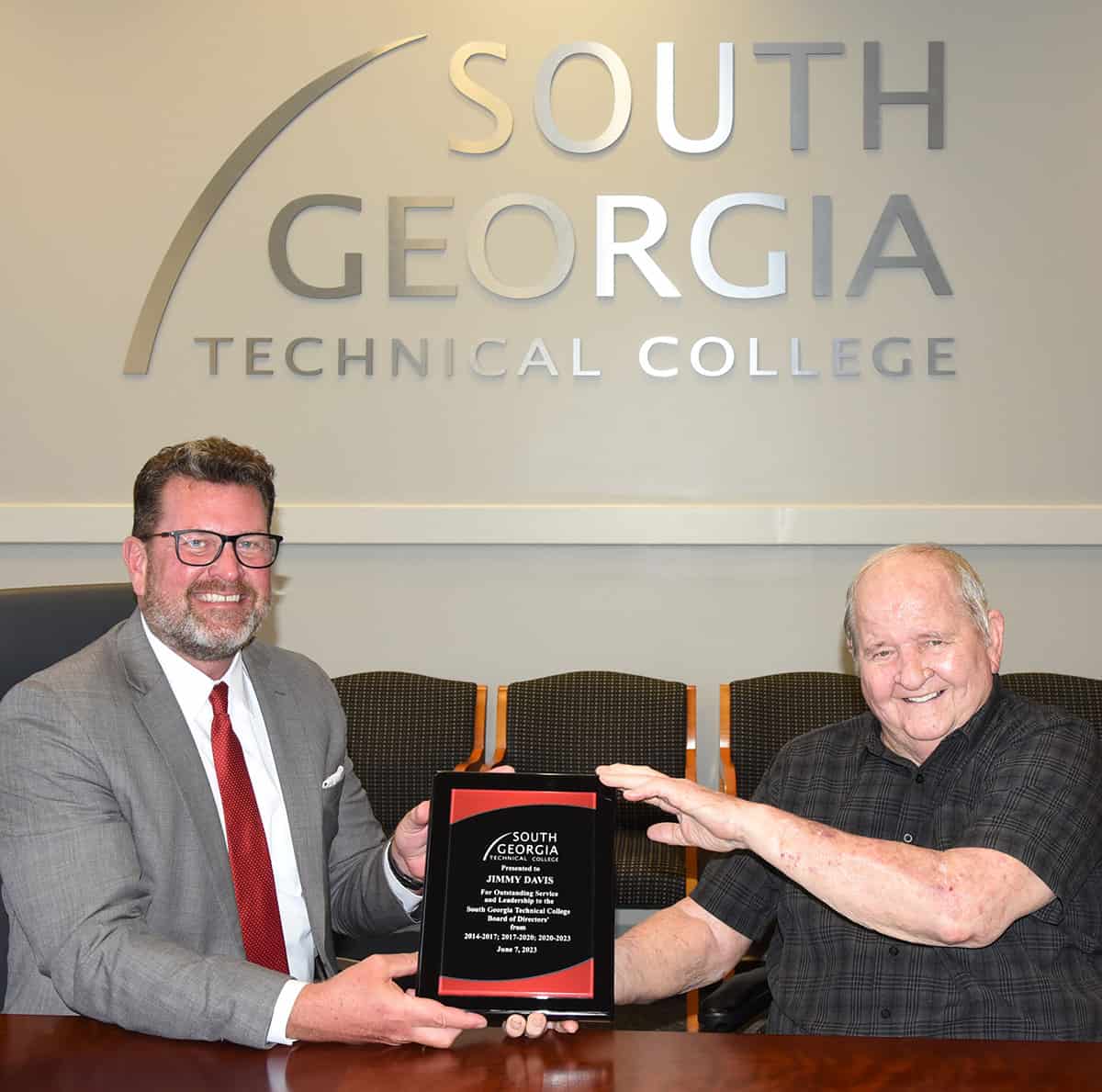 SGTC President Dr. John Watford (left) is shown above presenting outgoing SGTC Board of Directors member, Jimmy Davis, (right) with a plaque of appreciation for his service to the Board.