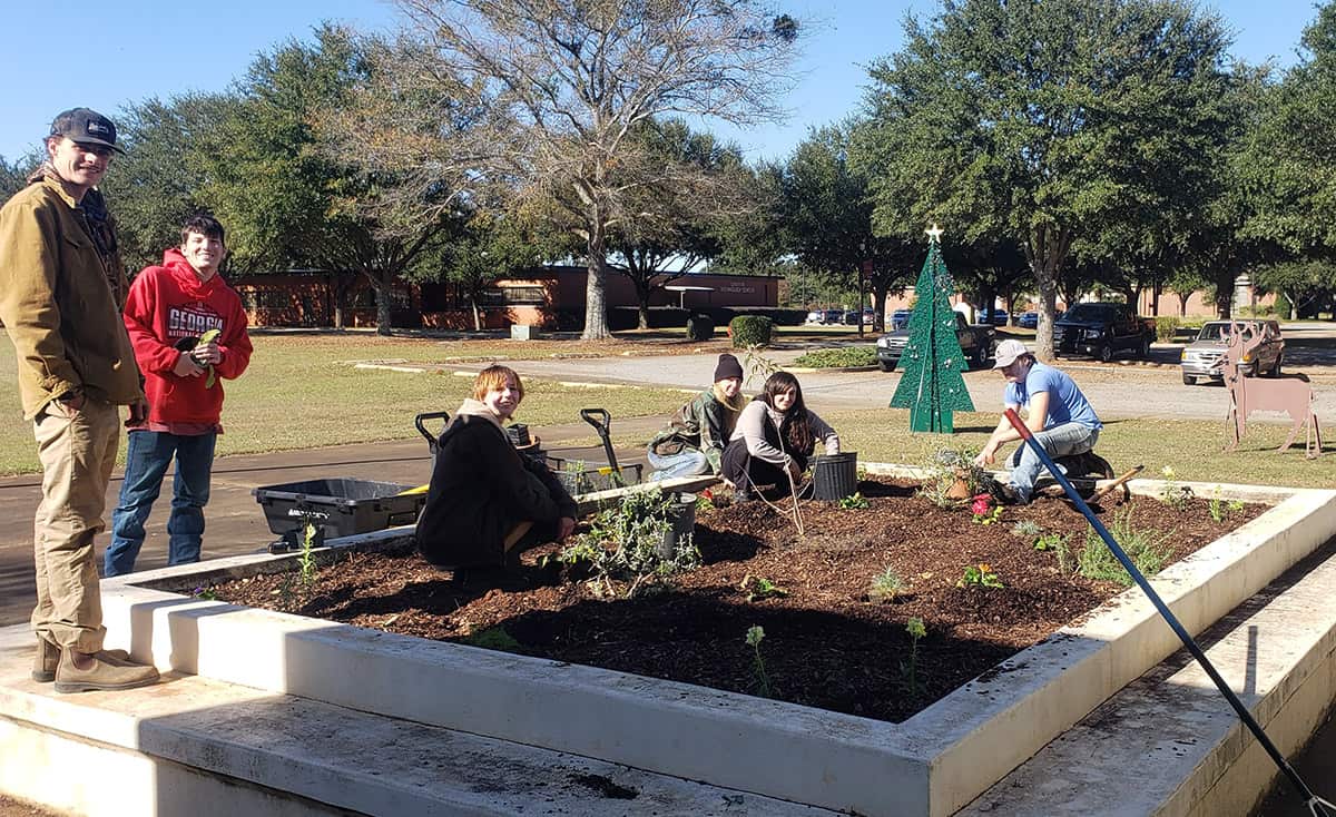 Shown above are SGTC Environmental Horticulture students John Owens, Jake Guest, Grace Hardage, Arial Hudson, Lisa Wade and Kyle Davis working in the new pollinator garden they created in memory of former First Lady Rosalynn Carter on the SGTC Americus campus.