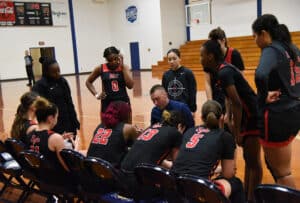 SGTC Lady Jets head coach Jason Carpenter is trying to motivate his team during the match-up with Andrew College.