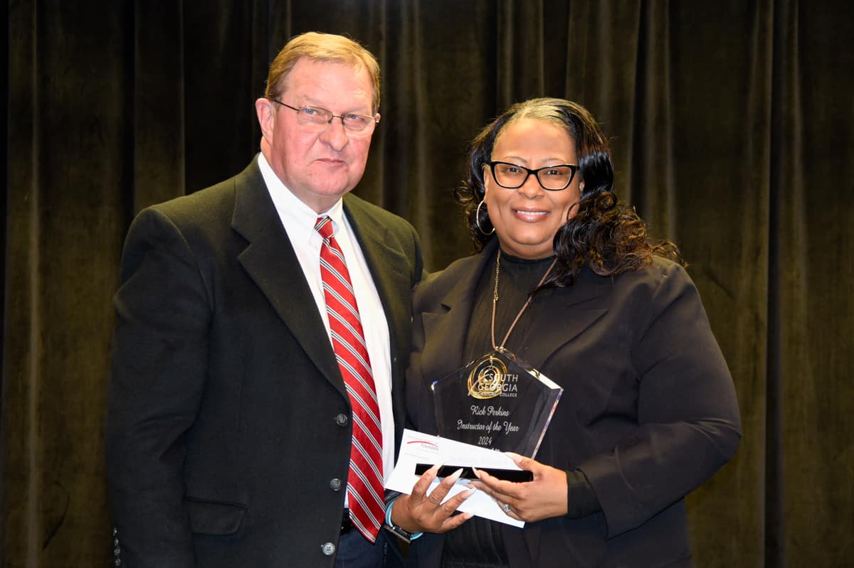 Synovus’ Emory Parker is shown above (l to r) presenting Dr. Michele Seay with a donation from Synovus for being selected as the South Georgia Technical College 2024 Rick Perkins Instructor of the Year.
