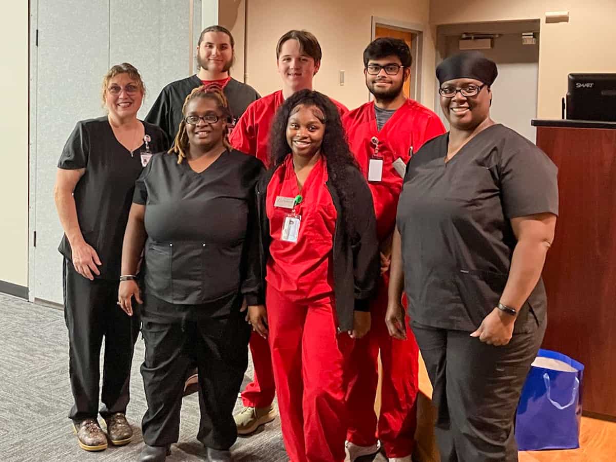 Pictured with instructor Janice Wiseman (left) are SGTC Crisp County Center Nurse Aide graduates (rear, l-r) Christian Jones, Avery Jordan, Parth Patel, (front, l-r) Brittany Collins, A’kayla Jackson, and Nigel Brooks. Not shown is graduate Jasmine Ridley.