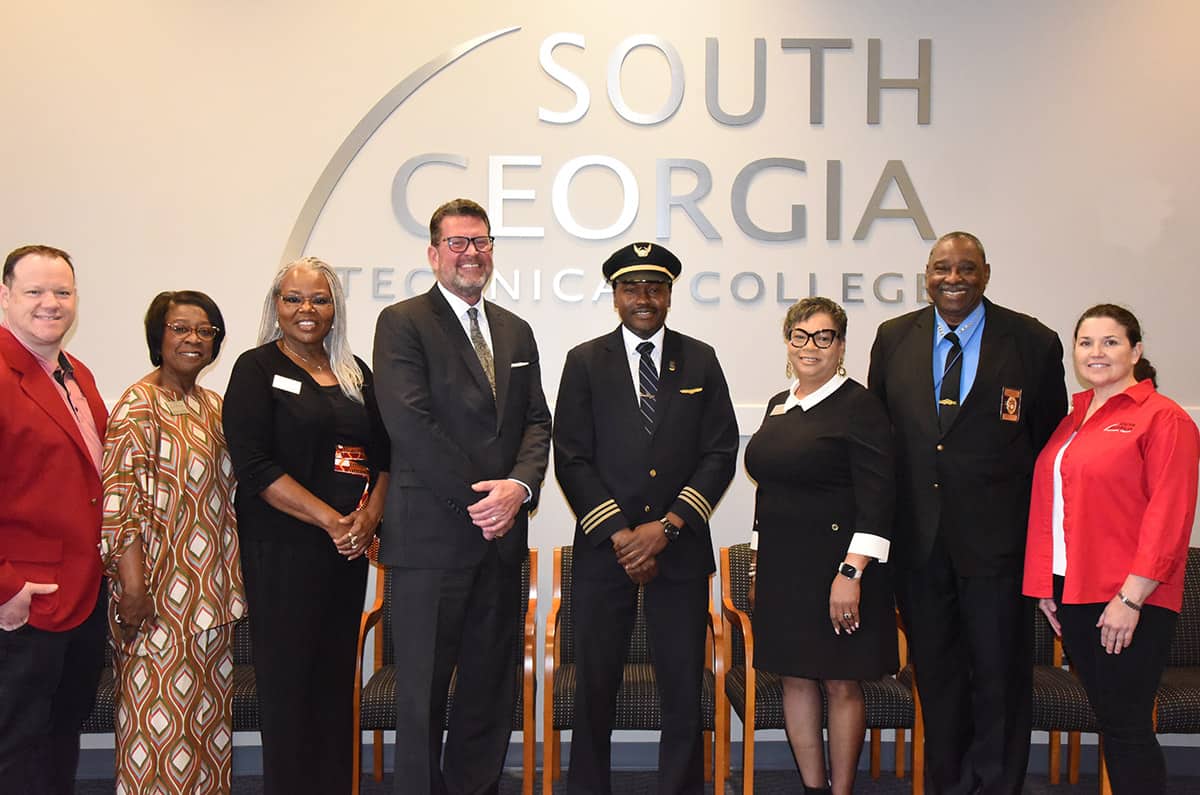 South Georgia Technical College President Dr. John Watford (left center) and speaker Troy D. Jones (right center) are shown above with the SGTC Black History Celebration program committee. They included: SGTC Assistant Vice President of Student Affairs Josh Curtin, SGTC Career Services Director Cynthia Carter, SGTC Cosmetology Instructor Dorothea Lusane-McKenzie, SGTC Executive Assistant to the President Teresa O’Bryant, SGTC Police Chief and Director of Campus Safety Sammy Stone, and lead Aviation Maintenance Instructor Victoria Herron.