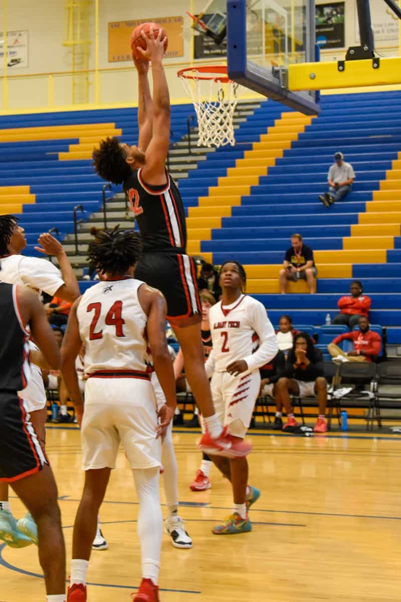 Jafeth Martinez of the South Georgia Technical College Jets goes up for a slam dunk in the NJCAA Region XVII Semi-final game against Albany Tech.