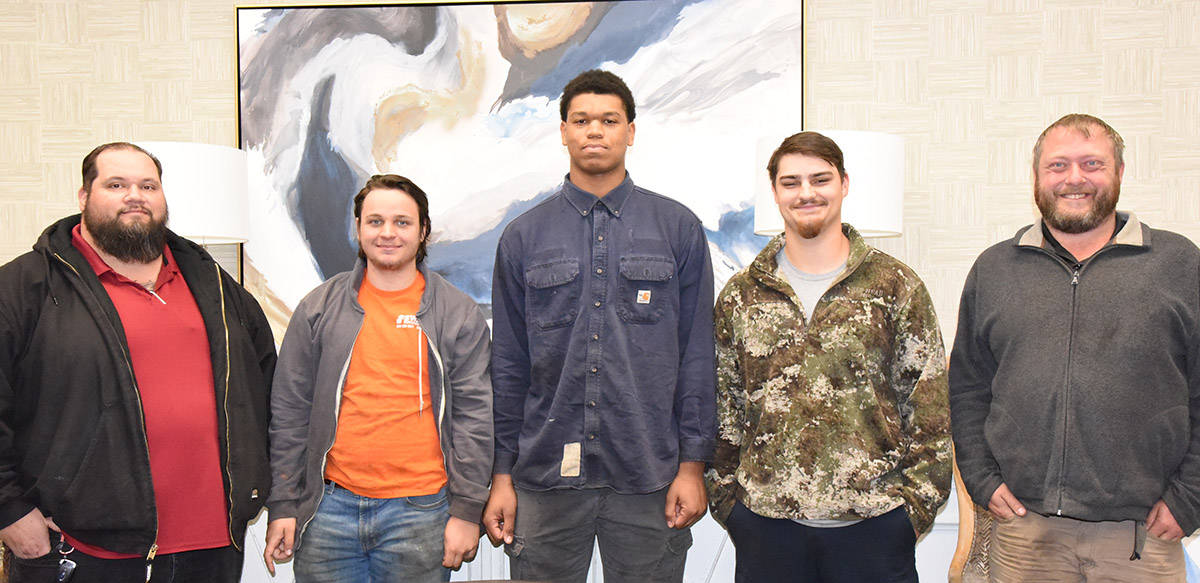 South Georgia Technical College Diesel Technology instructors David Cox (left) and Chase Shannon (right) are shown above with the SGTC Foundation’s three Caterpillar Excellence Scholarship winners. They are: Cole White, Ja’Ron Davis and Caleb Howard.