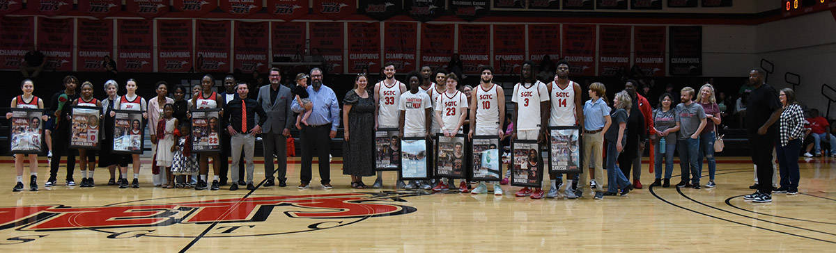 Shown above with SGTC President Dr. John Watford are the Jets and Lady Jets sophomore players and family and friends.