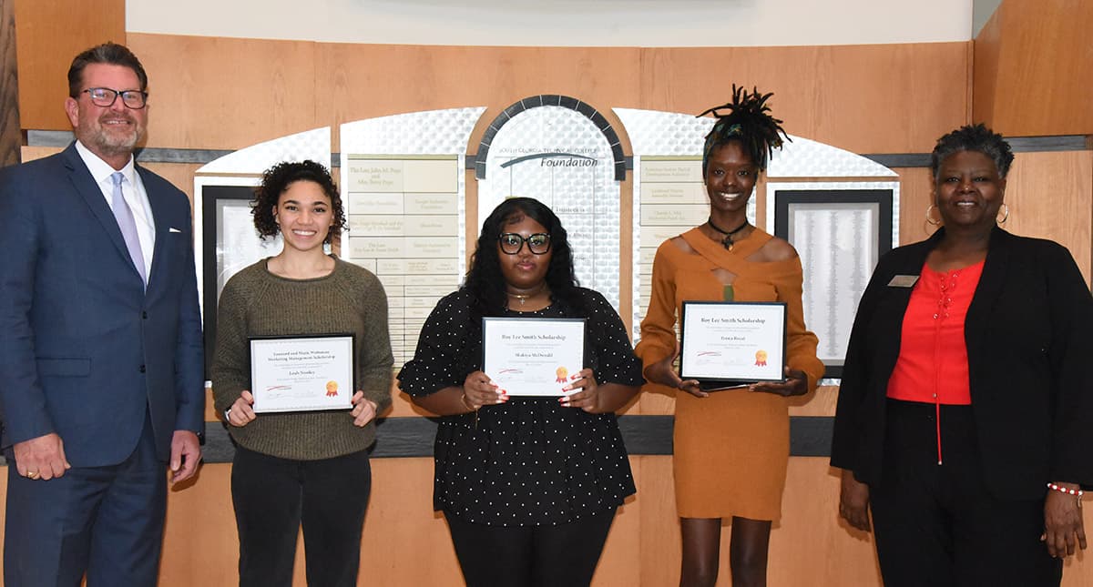 South Georgia Technical College President Dr. John Watford is shown above (l to r) with the three SGTC Marketing students who were presented with SGTC Foundation Scholarships recently. Leah Nunley received the Leonard and Marie Waitsman Marketing Scholaships and Shakiya McDonald and Tyona Royal both received the Roy Lee and Susan Smith Scholarships. They are shown with SGTC Marketing Management instructor Mary Cross.