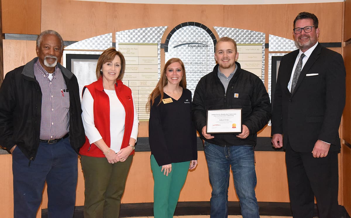 Shown above (l to r) on the front row is SGTC Lineworker Instructor Sidney Johnson, SGTC Economic Development Assistant and Partnership Coordinator Tami Blount, Andrea Walker, Chair of the Sumter EMC Foundation, with the Sumter EMC Electrical Lineworker Scholarship recipient Hunter Wilkes of Leesburg and SGTC President Dr. John Watford.