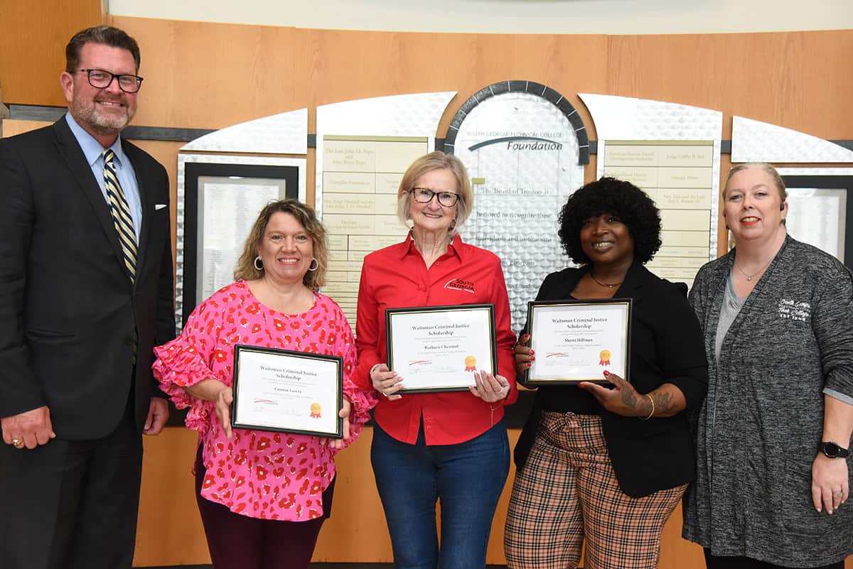 South Georgia Technical College President Dr. John Watford is shown above (l to r) with the three SGTC Criminal Justice students who were presented with SGTC Foundation Waitsman Criminal Justice Scholarships recently. They are Connie Leann Lowry of Cordele, Barbara Ann Chestnut of Mauk, and Sherri Hillman of Montezuma. Also shown is SGTC Americus Criminal Justice Instructor Teresa McCook.