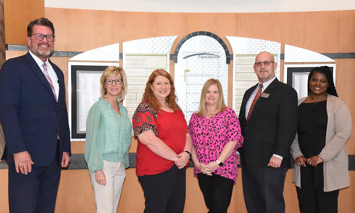 South Georgia Technical College President Dr. John Watford (l to r) is shown above congratulating SGTC Vice President of Academic Affairs Julie Partain, SGTC Practical Nursing Instructors Jennifer Childs and Christine Rundle, and Academic Deans Brett Murrah and Katice Taylor on the college receiving the GBHCW Nursing Grant to help enroll, retain, and graduate more nurses for our rural portion of Georgia.