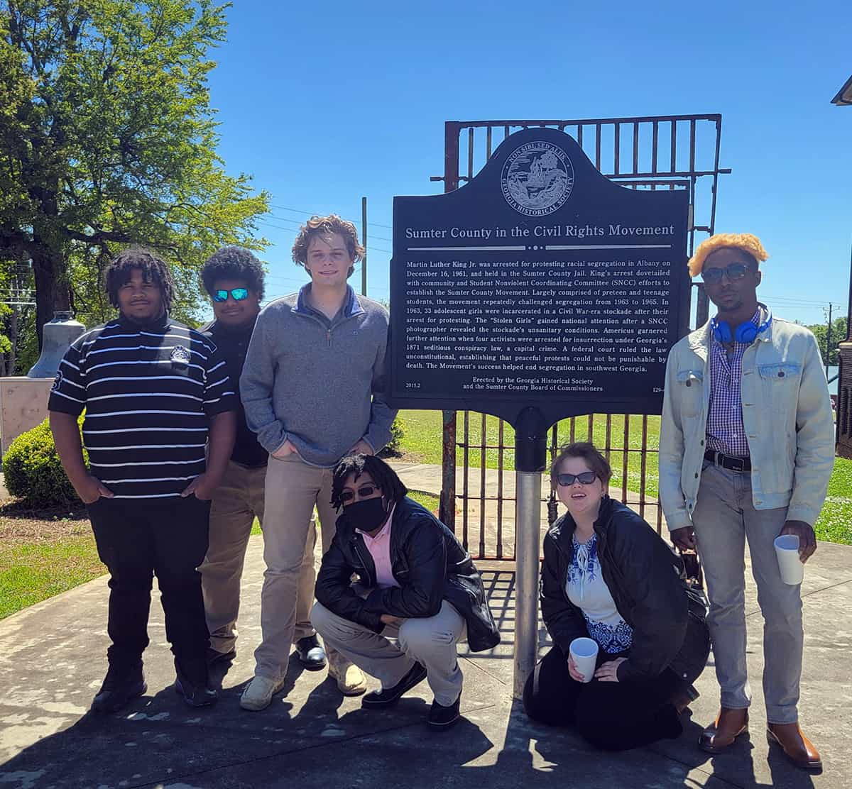 SGTC Criminal Justice Corrections Class students Jadeer Thompson, Damir Mincey, Jacob Abell, Jadon Bailey, Erin White and Ladeaveon Lockette are shown above in front of the Sumter County Courthouse sign.