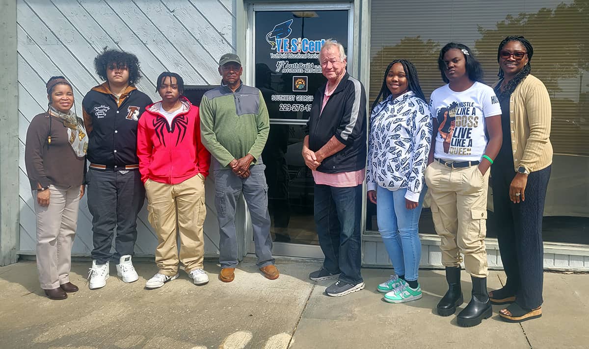 Pictured are members of the Empowerment Pathways Youth Build class with Program Manager Marisa Wedges (far left), instructor Luke Cason (center-right), and Career Coach Tomeika Davis (right). SGTC Career Services Director Cynthia Carter met with the students to provide resume-writing guidance.