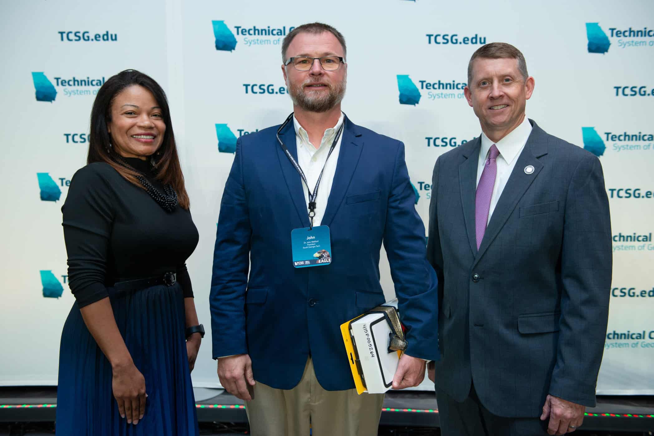 SGTC 2024 Adult Education Instructor Dr. Robbie Edalgo (c) from the Crisp County Center is shown above at the TCSG Eagle Conference with TCSG Assistant Commissioner for Adult Education Dr. Cayanna Good (l) and TCSG Commissioner Greg Dozier (r).