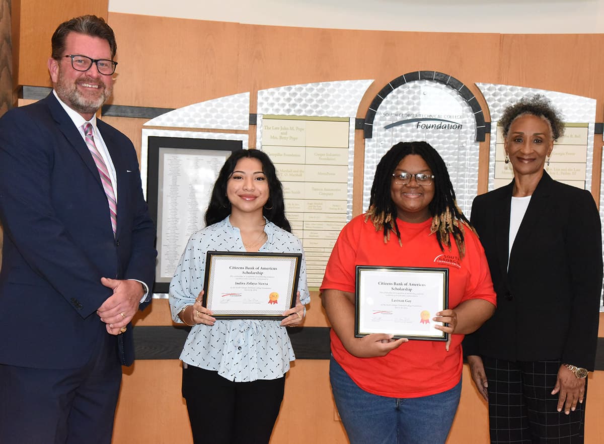 South Georgia Technical College President Dr. John Watford is shown above (l to r) SGTC Foundation Citizens Bank of Americus scholarship winners Indira M. Zelaya-Sierra and LaVivian Gay along with SGTC Accounting Instructor Brenda Boone.