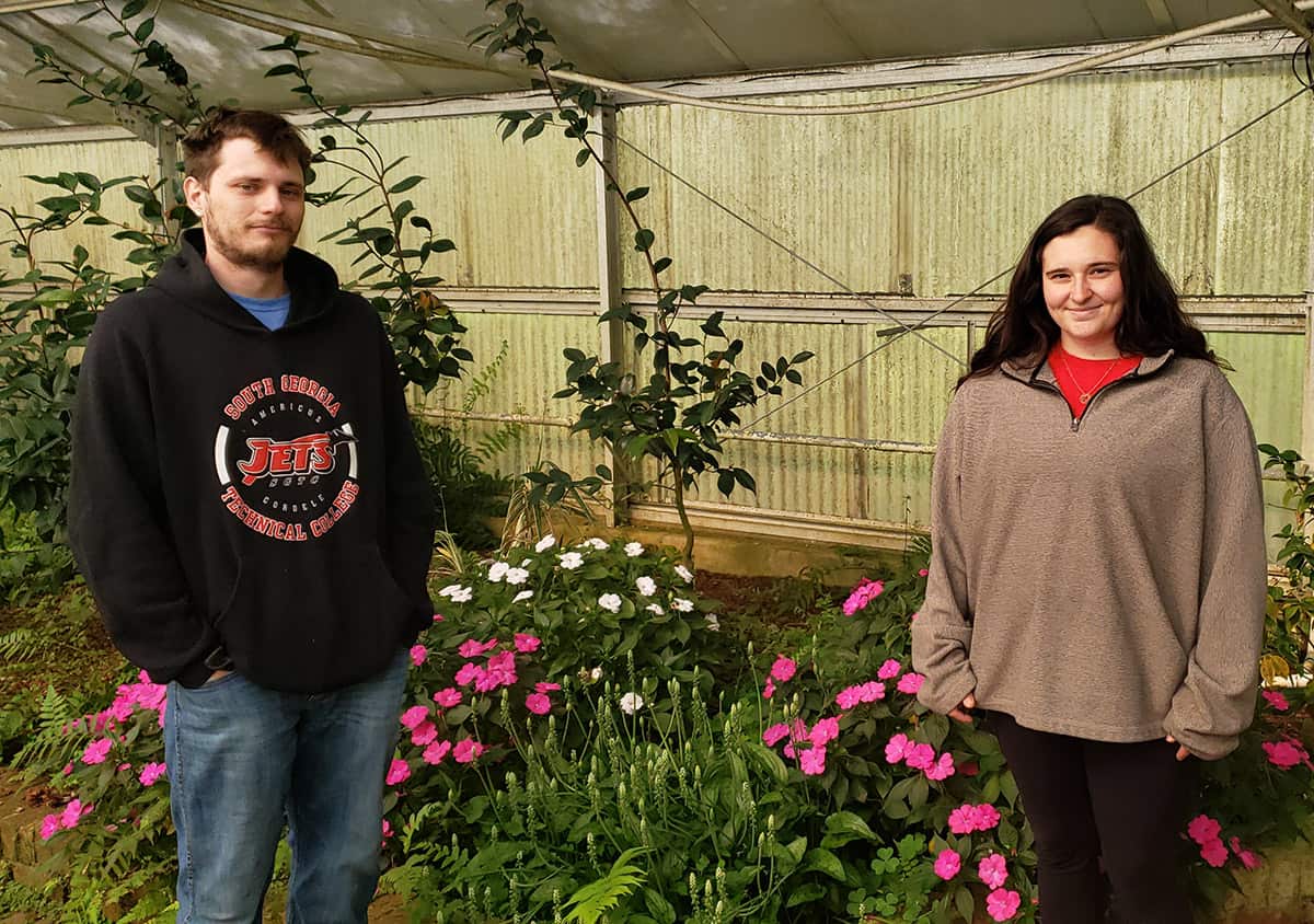 SGTC Horticulture students Kyle Davis and Arial Hudson are shown above enjoying a field trip to the American Camellia Society in Marshallville and the Fort Valley State Aquaponics facility with Instructor Brandon Gross.