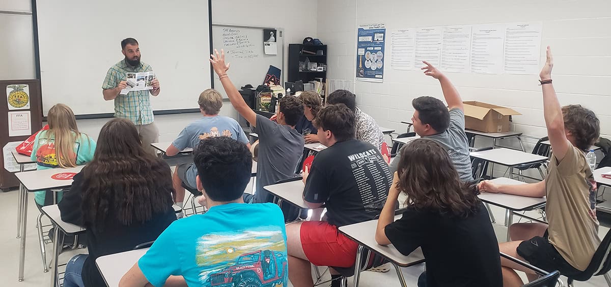 SGTC Horticulture Instructor Brandon Gross is shown above speaking to Schley County Agriculture Instructor Eric Sellars Agriculture students recently.